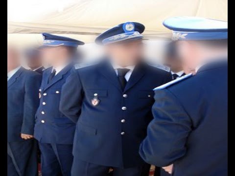 شاهد اعتقال ضابط شرطة ضمن عصابة