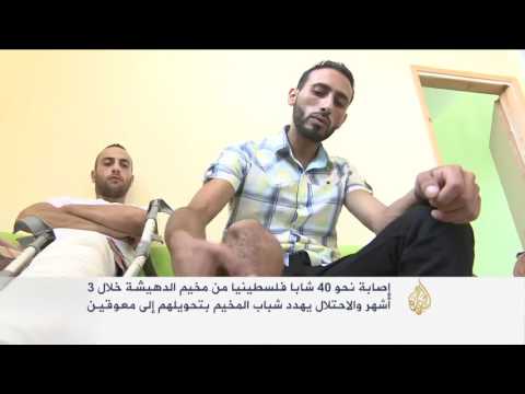 شاهد الاحتلال يتعمد إحداث إعاقات وسط الشبان المحتجين