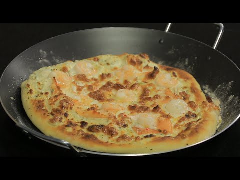 شاهد طريقة عمل بيتزا سي فود