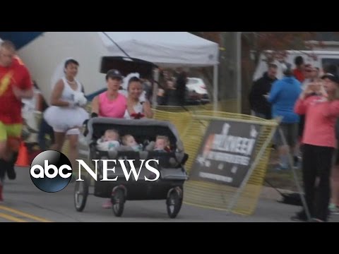 أميركية تشارك في ماراثون بصحبة صغارها التوائم الرضع