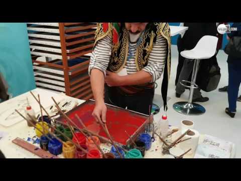 بالفيديو مبدع تركي يرسم على الماء ويخطف الأنظار في كوب22