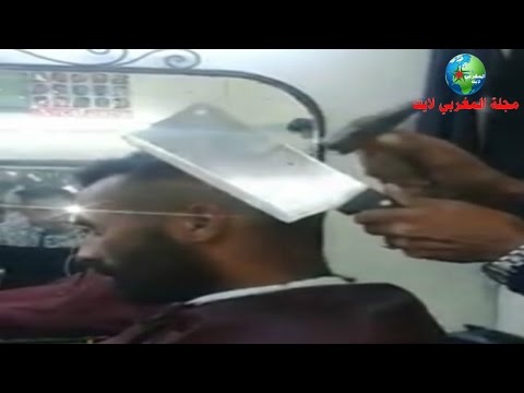 شاهد حلاقة الشعر بالمطرقة والساطور