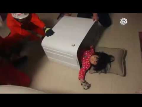 إنقاذ طفلة صينية علقت في غسالة ملابس