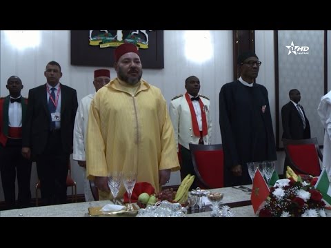 بالفيديو  الرئيس النيجيري يقيم مأدبة عشاء على شرف الملك محمد السادس