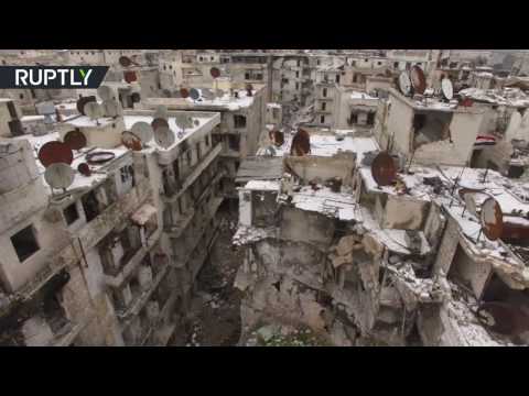 شاهد مناطق مدمرة بالكامل مغطاة بالثلوج في حلب
