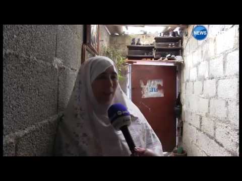 بالفيديو عائلة بسيطة تعيش وسط مقبرة مسيحية في حي الشهداء