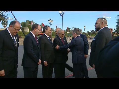 شاهد ملك الأردن يعانق بنكيران في حفل استقباله