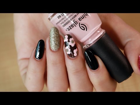 مناكير أسود بنقشة أزهار الربيع