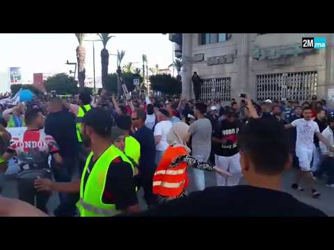 شاهد  المتظاهرون يُشكلّون سلاسل بشرية لحماية الممتلكات الخاصة