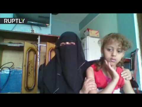 يمنية تهرب مع طفلتها خشية تزويجها من رجل في الثمانينات