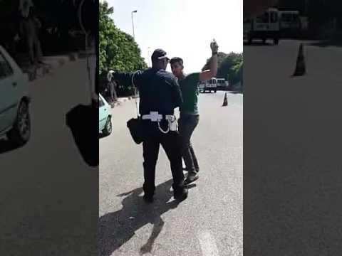 بالفيديو  شجار بين شاب مغربي وأحد رجال الشرطة