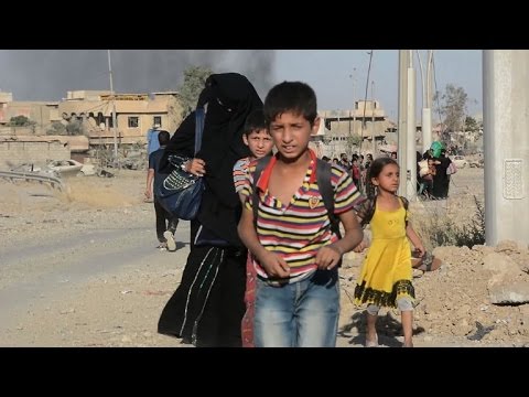 هروب مئات المدنيين من حي زنجيلي غرب مدينة الموصل