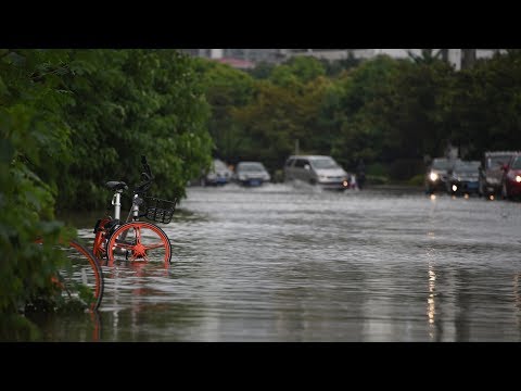 الأمطار الغزيرة فى الصين ترفع منسوب المياه وتهدد بفيضانات