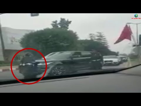 شاهد مغربية تحاول دهس رجال الشرطة وسط ذهول المارة