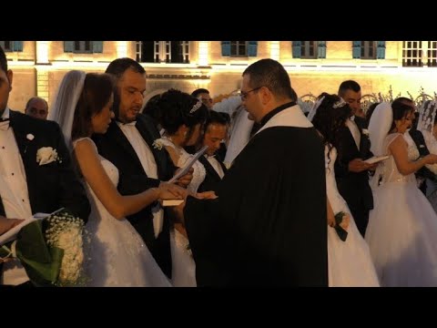 شاهد 13 ثنائيًا قالوا نعم في زفاف جماعي في لبنان