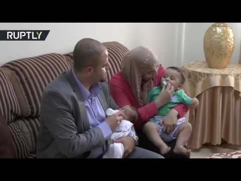فلسطيني يطلق اسم بشار الأسد على مولوده الجديد