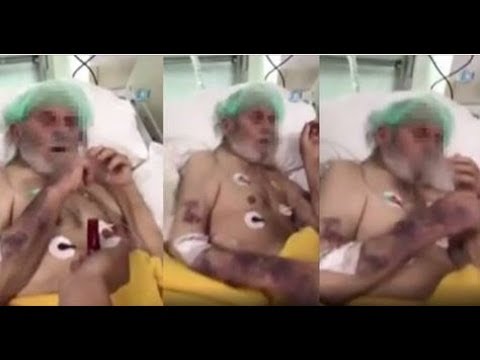 شاهد مريض مسن في غرفة الإنعاش يدخن سجائر