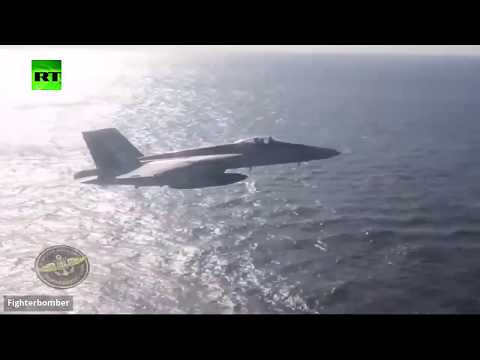 شاهد اقتراب خطير لطائرة إيل38 روسية من حاملة طائرات أميركية
