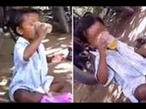 بالفيديو طفل عمره 4 أعوام يشرب البيرة مثل الرجال