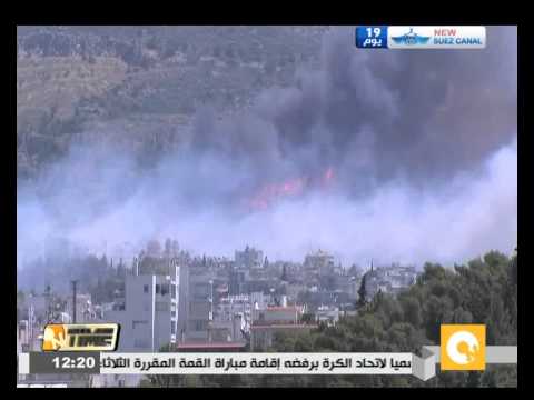 فيديو فرار عشرات المواطنين من حرائق الغابات في اليونان