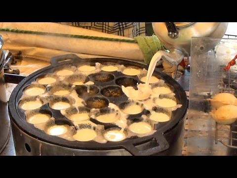 بالفيديو بان كيك جوز الهند من طعام الشارع في بانكوك