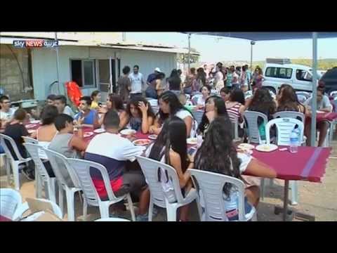 شاهد فلسطينيون يعودون إلى قرية أجدادهم سنويا