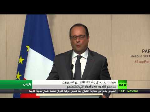 هولاند يدعو إلى حل مشكلة اللاجئين السوريين