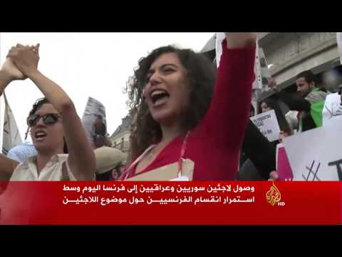 وصول لاجئين سوريين وعراقيين إلى فرنسا