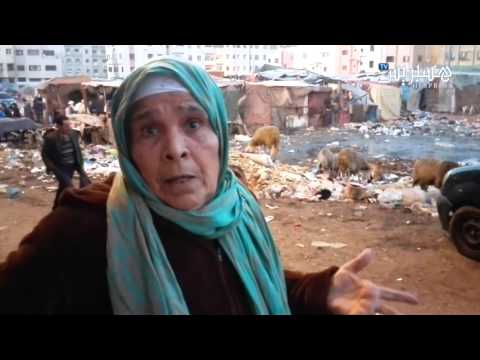 شاهد معاناة الأهالي وسط القمامة