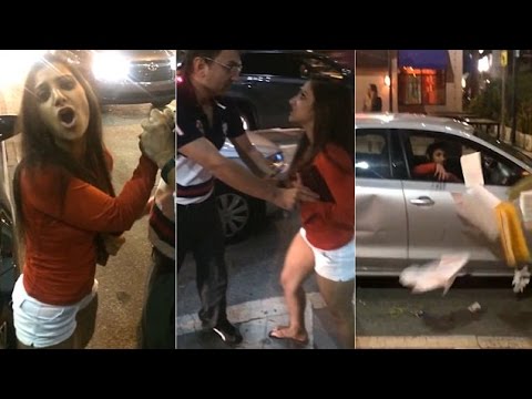 شاهد فتاة تعتدي على سائق أجرة في الشارع