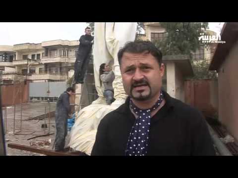 نحات يكرم المرأة الكردية المقاتلة بعمل فني كبير