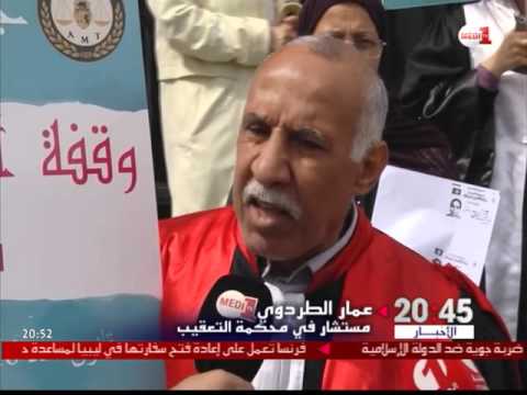 شاهد  وقفات احتجاجية صامتة للقضاة أمام المحاكم