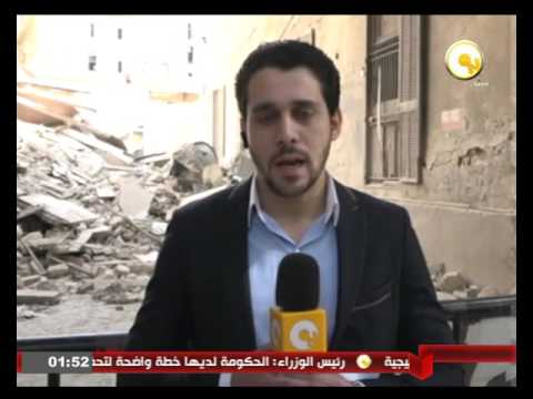 بالفيديو آثار انهيار عقار وجزء من مدرسة في منطقة وسط البلد في القاهرة