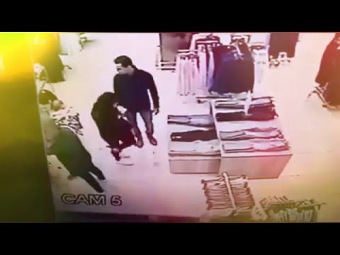 بالفيديو شاب وصديقته الحسناء يسرقان حقيبة امرأة فى أحد مولات أكتوبر