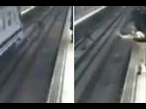 بالفيديو شرطي إسباني ينقذ رجل من الموت المحقق بأعجوبة شديدة