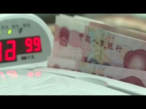 new yuan loans hit oneyear low