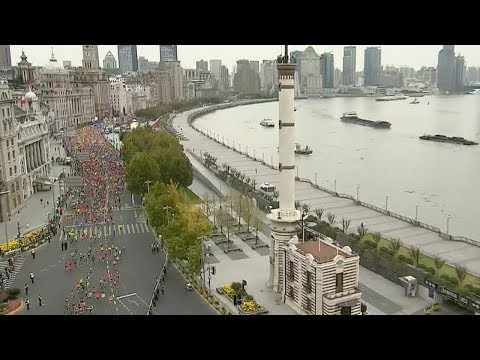 african runners win mens and womens titles