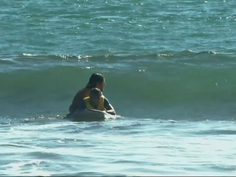 disabled people take on surfing
